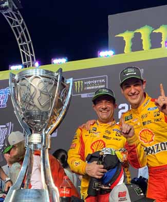 Fox and Joey Logano celebrate the 2018 NASCAR Cup Series Championship.